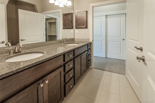 bathroom featuring tile patterned floors and vanity