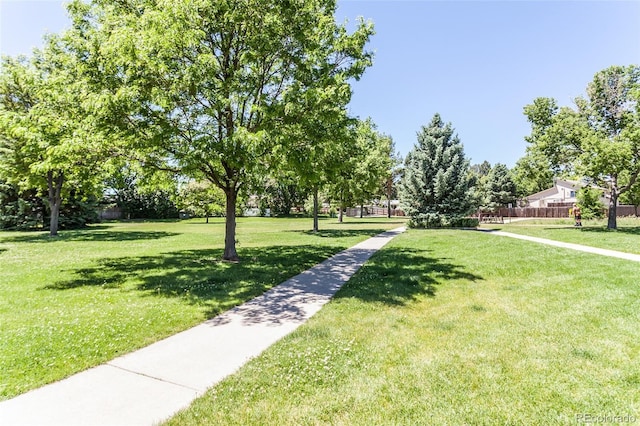 view of home's community featuring a yard