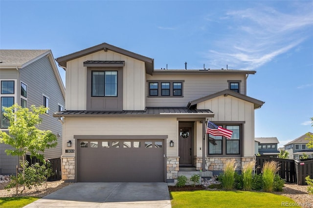 9016 Moondance Dr, Littleton, CO 80125 - view of front of property featuring stone siding, a garage, concrete driveway, and board and batten siding