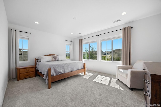 9016 Moondance Dr, Littleton, CO 80125 - bedroom with multiple windows, light carpet, and recessed lighting