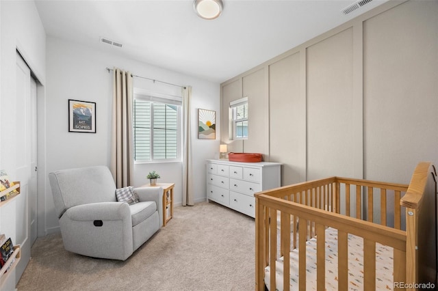 9016 Moondance Dr, Littleton, CO 80125 - bedroom with a nursery area and light colored carpet