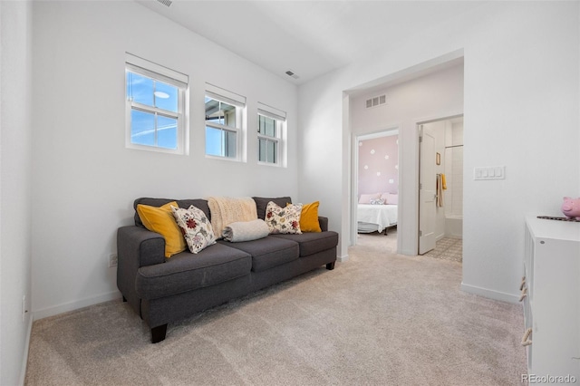 9016 Moondance Dr, Littleton, CO 80125 - living area with light colored carpet and baseboards