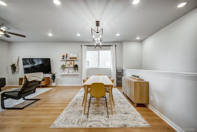 5771 Slate River Pl, Brighton, CO 80601 - dining area with light wood-type flooring, baseboards, a ceiling fan, recessed lighting, and a chandelier