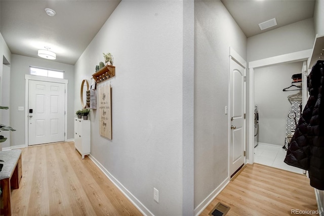 5771 Slate River Pl, Brighton, CO 80601 - foyer with light wood-style floors and baseboards