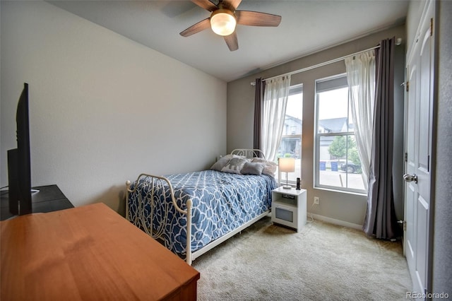 5771 Slate River Pl, Brighton, CO 80601 - carpeted bedroom featuring baseboards, ceiling fan, and lofted ceiling