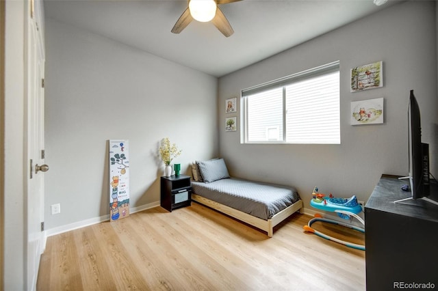5771 Slate River Pl, Brighton, CO 80601 - bedroom with wood finished floors, baseboards, and a ceiling fan