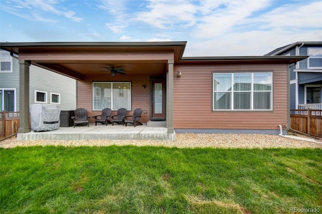 5771 Slate River Pl, Brighton, CO 80601 - rear view of property with ceiling fan and a patio area