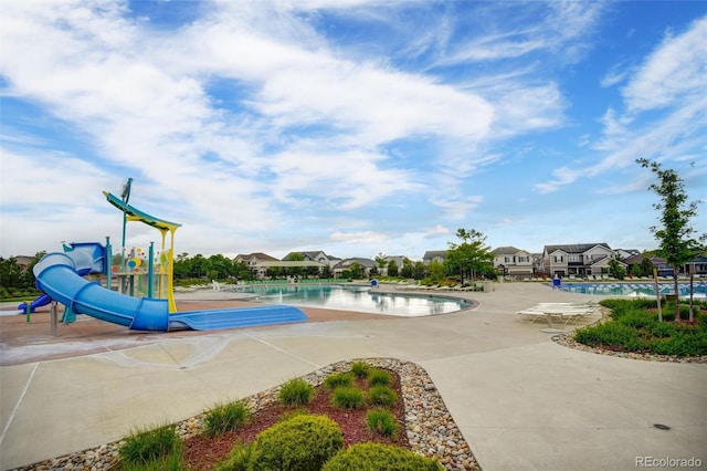 5771 Slate River Pl, Brighton, CO 80601 - community pool featuring a patio
