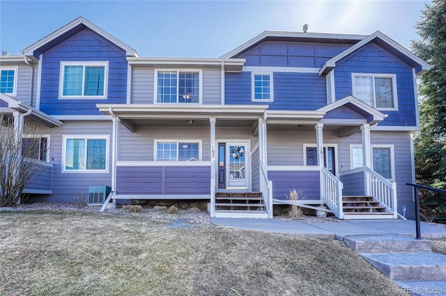 view of front of home with central AC and entry steps