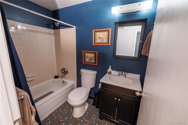 18908 E Napa Dr, Aurora, CO 80013 - bathroom featuring toilet, shower / bathtub combination with curtain, vanity, and tile patterned floors