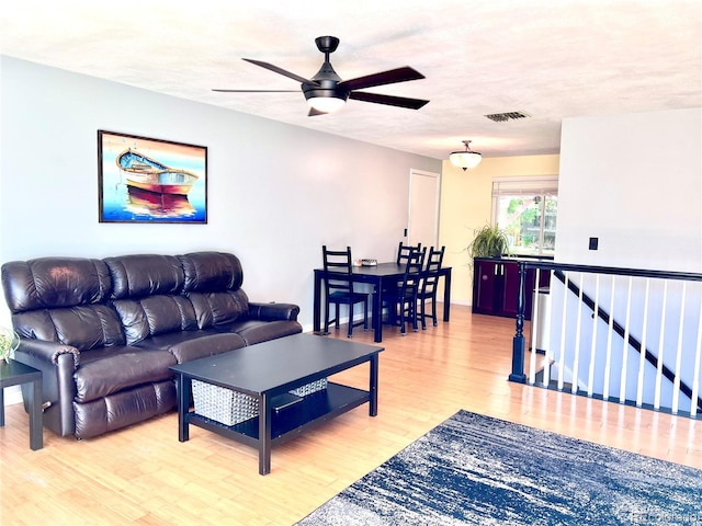 18908 E Napa Dr, Aurora, CO 80013 - living area featuring light wood-style floors and a ceiling fan