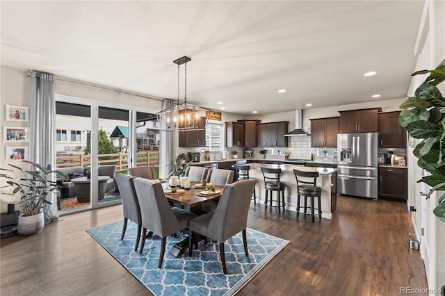 10091 Hannaway Dr, Colorado Springs, CO 80924 - dining area featuring plenty of natural light, dark wood-style floors, recessed lighting, and a chandelier