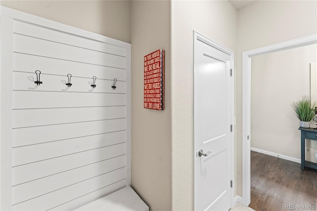 10091 Hannaway Dr, Colorado Springs, CO 80924 - mudroom featuring wood finished floors and baseboards