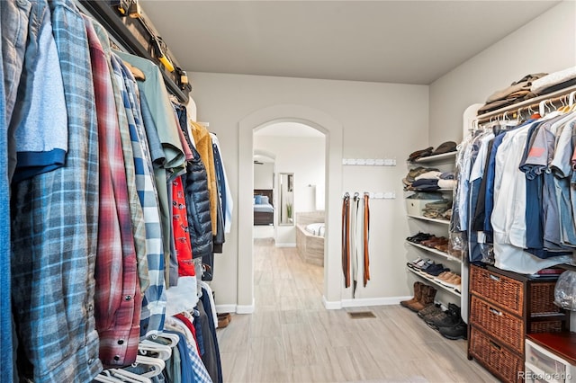 10091 Hannaway Dr, Colorado Springs, CO 80924 - spacious closet featuring arched walkways
