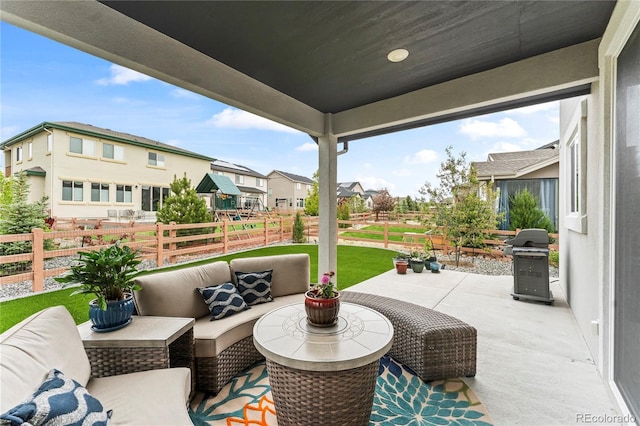 10091 Hannaway Dr, Colorado Springs, CO 80924 - view of patio with grilling area, a residential view, and an outdoor hangout area