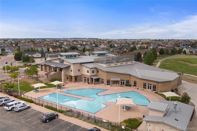 10091 Hannaway Dr, Colorado Springs, CO 80924 - community pool with a residential view and a patio area