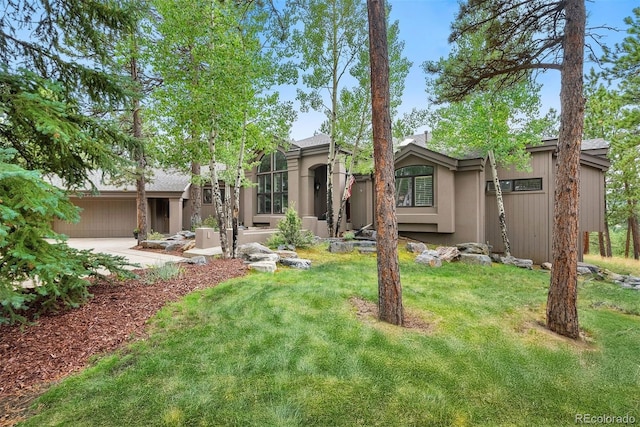 view of yard featuring a garage