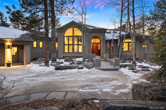 view of snow covered property