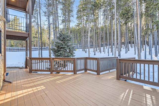 view of snow covered deck