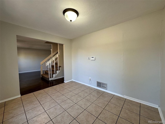 view of tiled spare room