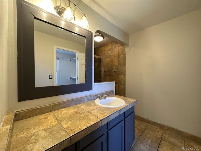 bathroom featuring tile flooring and oversized vanity