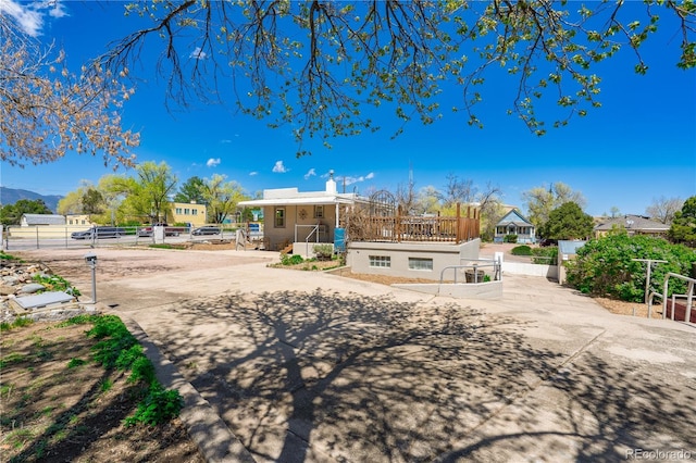 831 Manitou Blvd, Colorado Springs, CO 80904 - view of front of home featuring fence and stucco siding