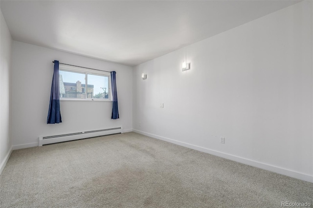 1245 Columbine St Unit 306, Denver, CO 80206 - spare room featuring baseboard heating and carpet floors