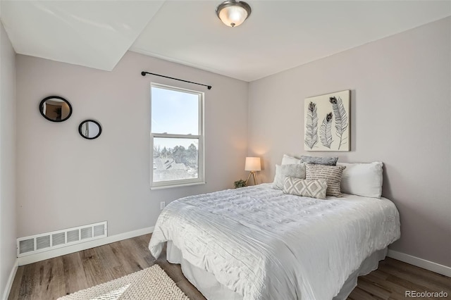 499 Wright St Unit 308, Lakewood, CO 80228 - bedroom with visible vents, baseboards, and wood finished floors
