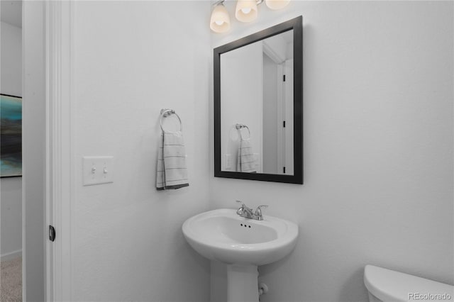 8550 Cheraw St, Littleton, CO 80125 - bathroom featuring toilet