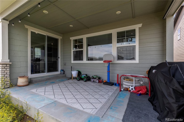 8550 Cheraw St, Littleton, CO 80125 - view of patio featuring a grill