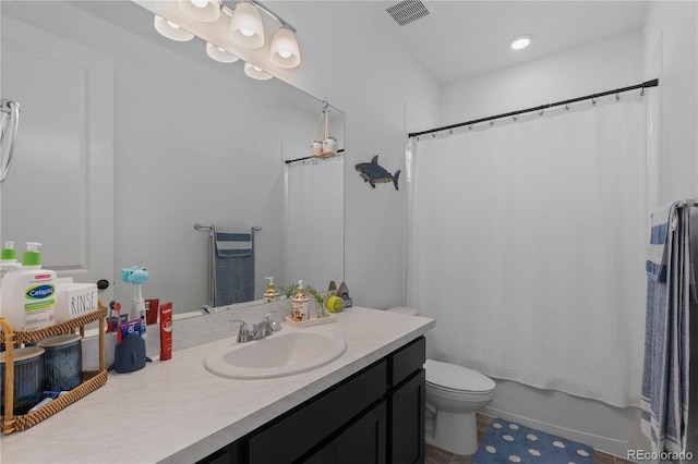 8550 Cheraw St, Littleton, CO 80125 - bathroom featuring vanity, shower / bath combo, and tile patterned flooring