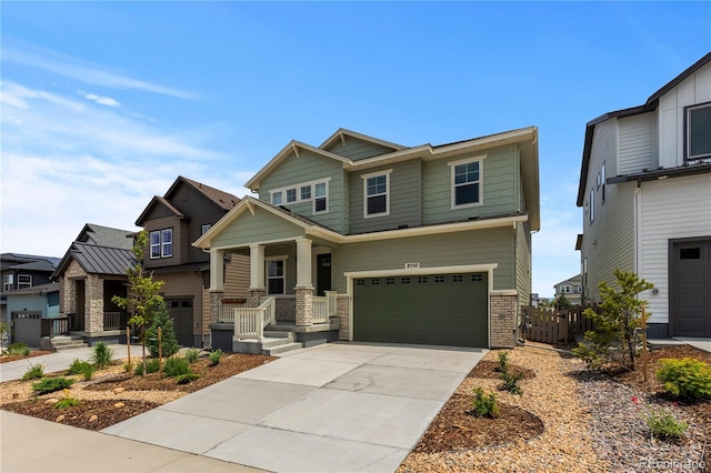 8550 Cheraw St, Littleton, CO 80125 - craftsman-style home featuring a garage, covered porch, and driveway
