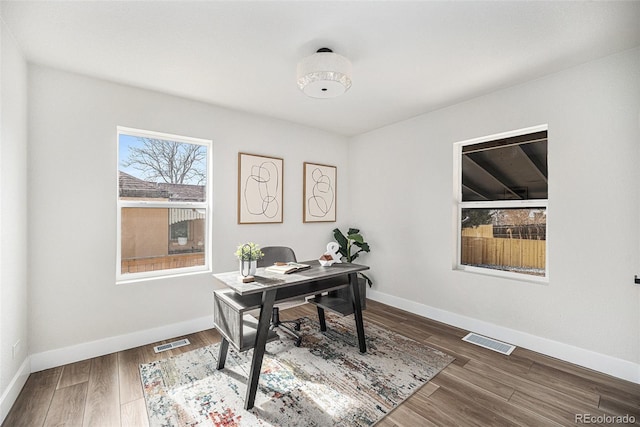 home office featuring hardwood / wood-style floors