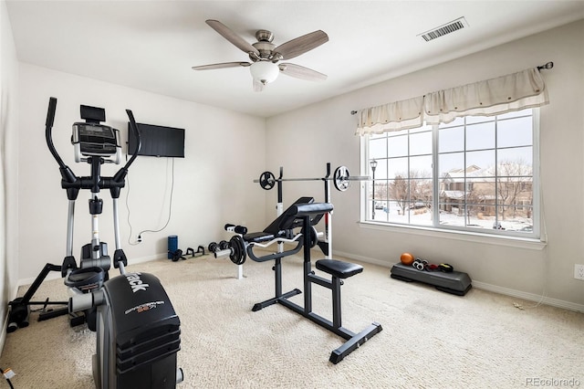 workout room with carpet floors and ceiling fan