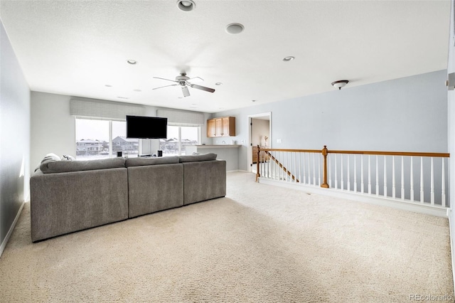 living room featuring ceiling fan