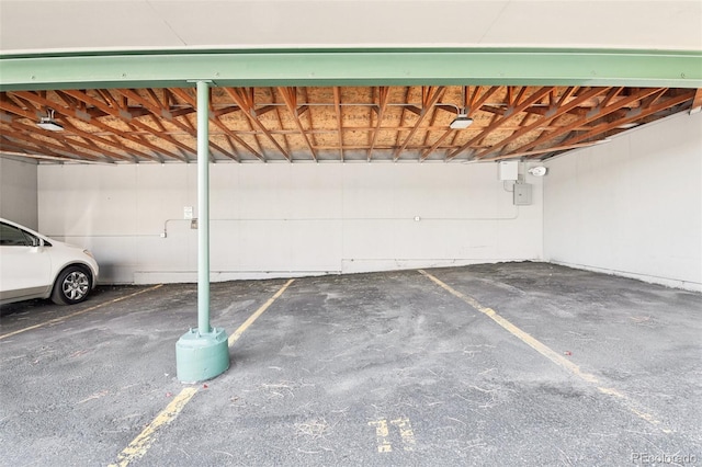 garage featuring a carport