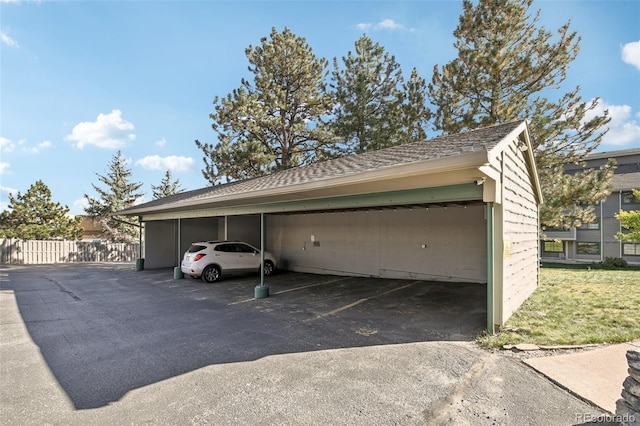 view of car parking with a carport