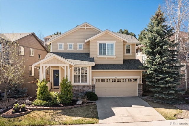 3092 Windridge Cir, Highlands Ranch, CO 80126 - craftsman house with an attached garage, a shingled roof, stone siding, and concrete driveway
