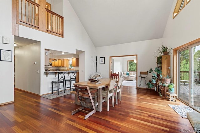 100 Moon Gulch Rd, Rollinsville, CO 80422 - dining room with high vaulted ceiling and wood finished floors