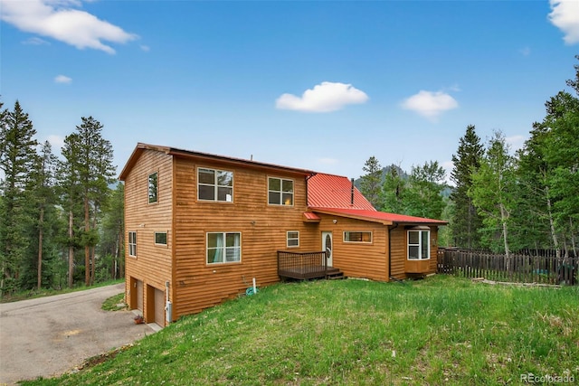 100 Moon Gulch Rd, Rollinsville, CO 80422 - back of house featuring an attached garage and driveway