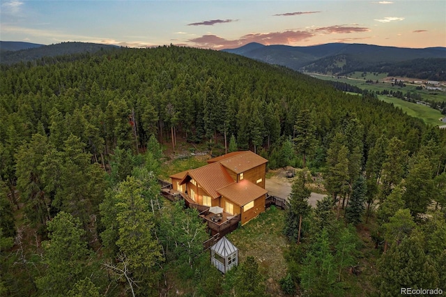 100 Moon Gulch Rd, Rollinsville, CO 80422 - aerial view at dusk of a wooded view and a mountain view