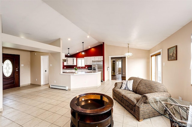 living room with a baseboard heating unit, light tile patterned floors, lofted ceiling, and baseboards