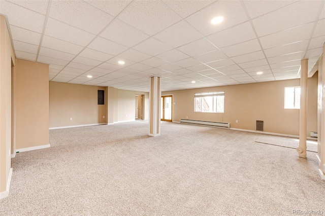 below grade area featuring baseboard heating, carpet flooring, baseboards, a baseboard heating unit, and recessed lighting