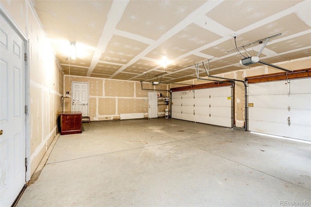 garage featuring a garage door opener