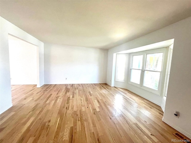 4753 S Gar Way, Littleton, CO 80123 - empty room featuring light wood finished floors