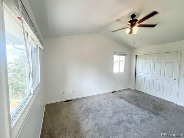 4753 S Gar Way, Littleton, CO 80123 - unfurnished bedroom with lofted ceiling, carpet flooring, a closet, and a ceiling fan