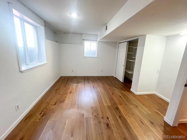 4753 S Gar Way, Littleton, CO 80123 - unfurnished bedroom with wood finished floors and a closet