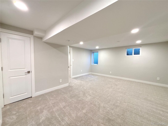 finished basement with carpet floors, recessed lighting, and baseboards