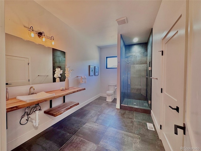 1282 N Crystal Rd, Lake George, CO 80827 - full bath with toilet, a stall shower, a sink, and baseboards