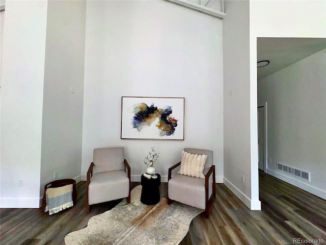 1282 N Crystal Rd, Lake George, CO 80827 - sitting room featuring dark wood-style floors and baseboards